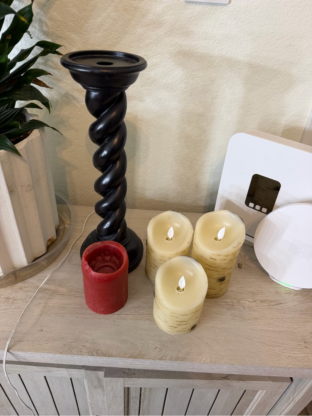 Black Twisted Pillar Candle Holder with Red and Cream Accent Candles